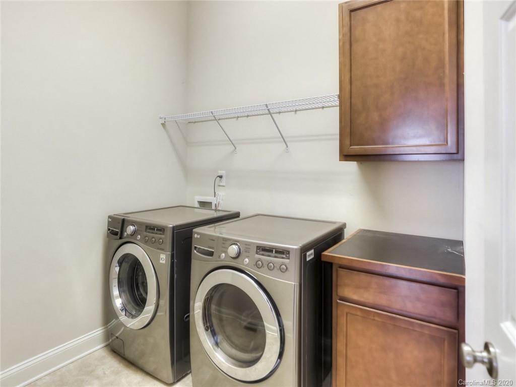 899 Stratford Run Drive Fort Mill, SC 29708 - Photo 23 of 48 a utility room with dryer and washer