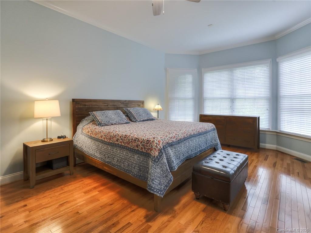 899 Stratford Run Drive Fort Mill, SC 29708 - Photo 25 of 48 a bed room with a bed and a night stand