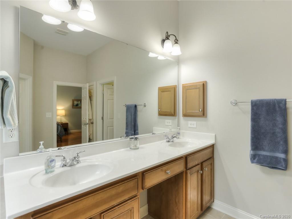 899 Stratford Run Drive Fort Mill, SC 29708 - Photo 29 of 48 a bathroom with a sink vanity and a mirror