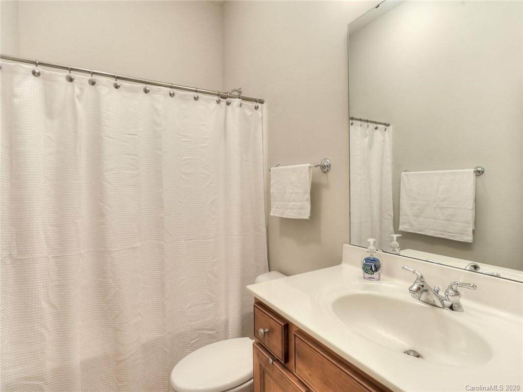 899 Stratford Run Drive Fort Mill, SC 29708 - Photo 30 of 48 a bathroom with a sink toilet and shower