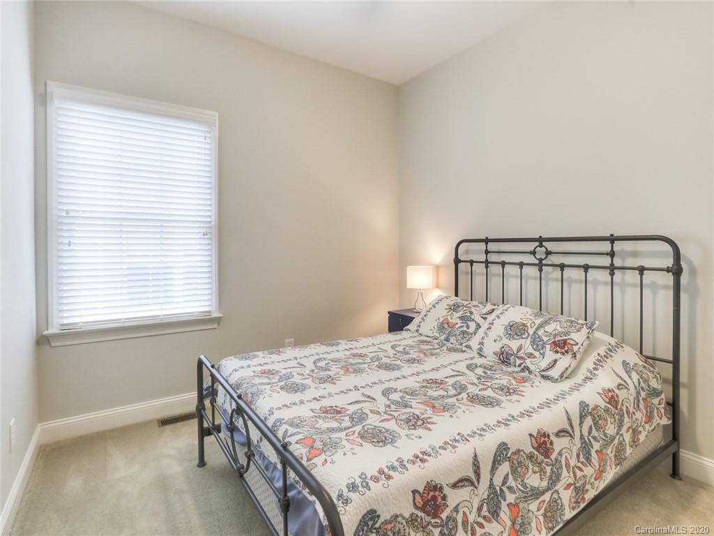 899 Stratford Run Drive Fort Mill, SC 29708 - Photo 31 of 48 a bedroom with a bed and a window