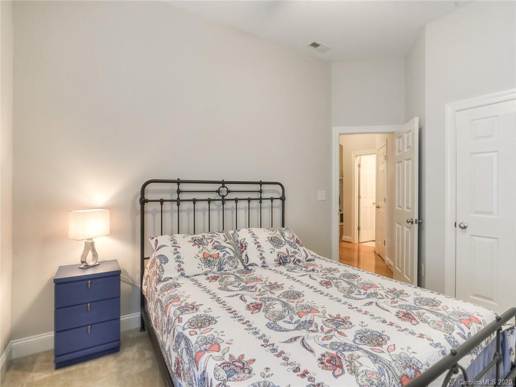 899 Stratford Run Drive Fort Mill, SC 29708 - Photo 32 of 48 a bedroom with a bed and a window