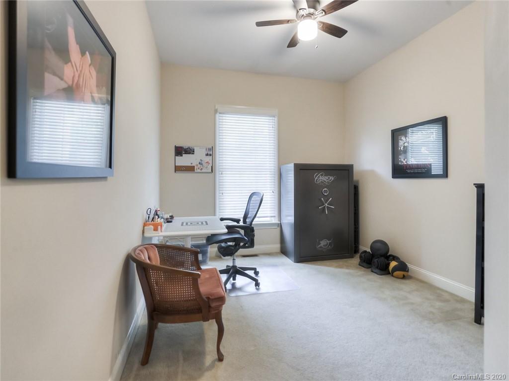 899 Stratford Run Drive Fort Mill, SC 29708 - Photo 39 of 48 a workspace with furniture and white walls