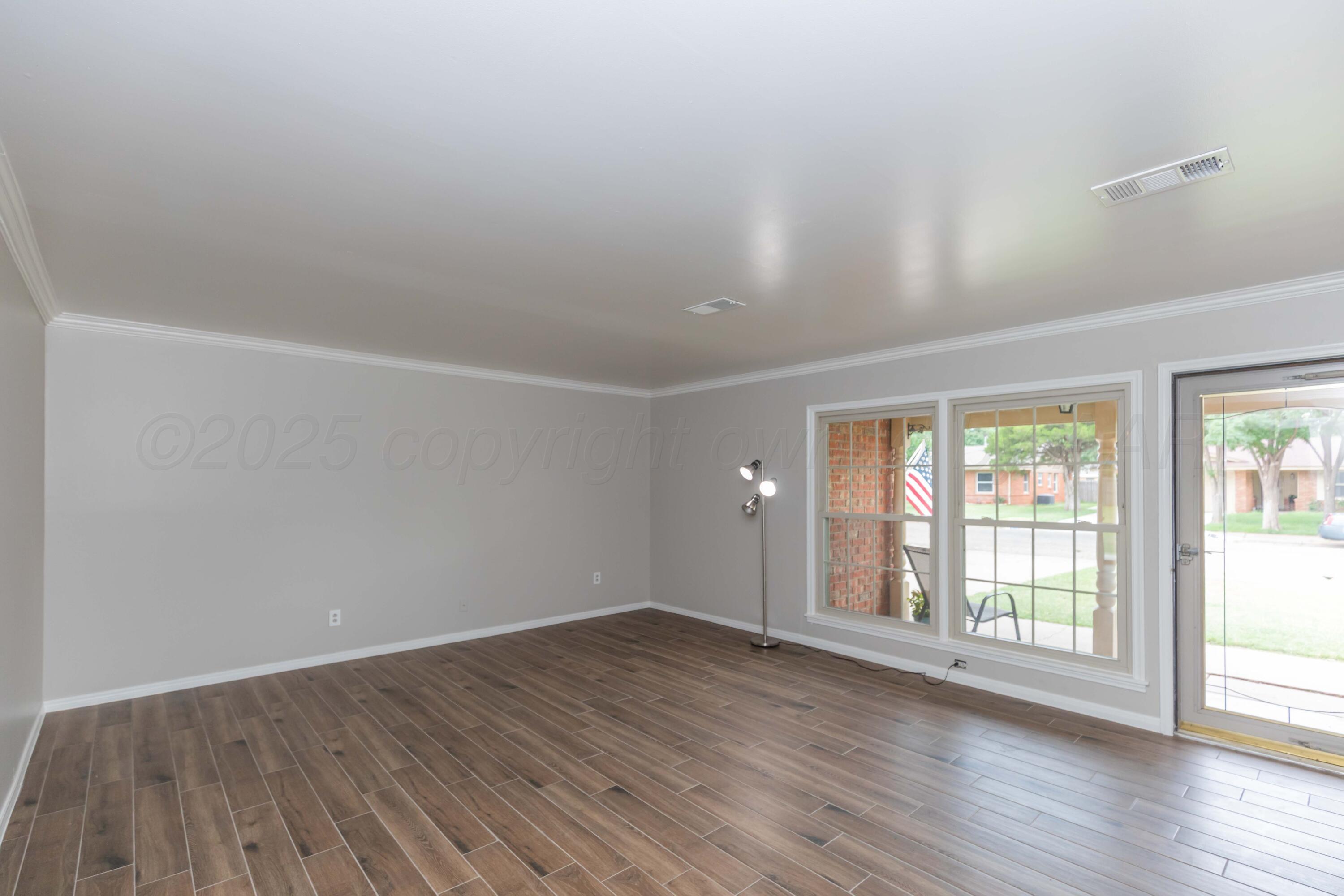 5519 Alvarado Road Amarillo, TX 79106 - Photo 4 of 38 LIVING ROOM VIEW 1