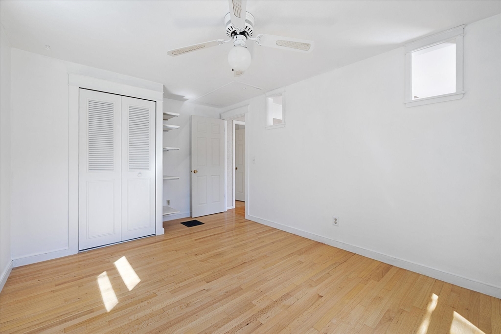 32 Bayberry Road Woonsocket, RI 02895 - Photo 14 of 26 a view of an empty room with wooden floor