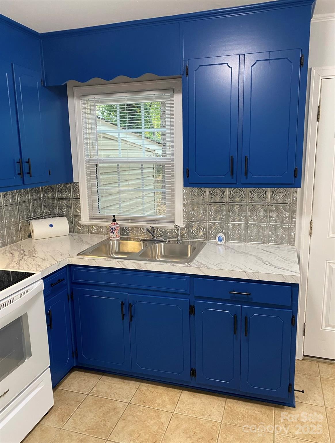 4100 Howie Circle Charlotte, NC 28205 - Photo 3 of 8 a bathroom with a sink and a mirror