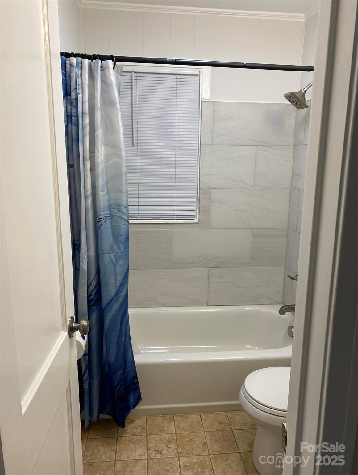 4100 Howie Circle Charlotte, NC 28205 - Photo 7 of 8 a bathroom with a bathtub and a shower