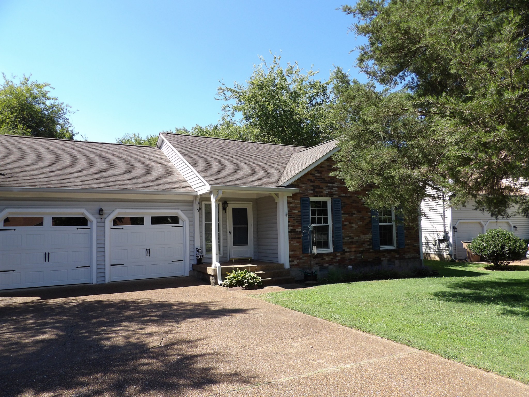 317 Cedarcliff Road Antioch, TN 37013 - Photo 2 of 31 a view of a house with a yard and potted plants