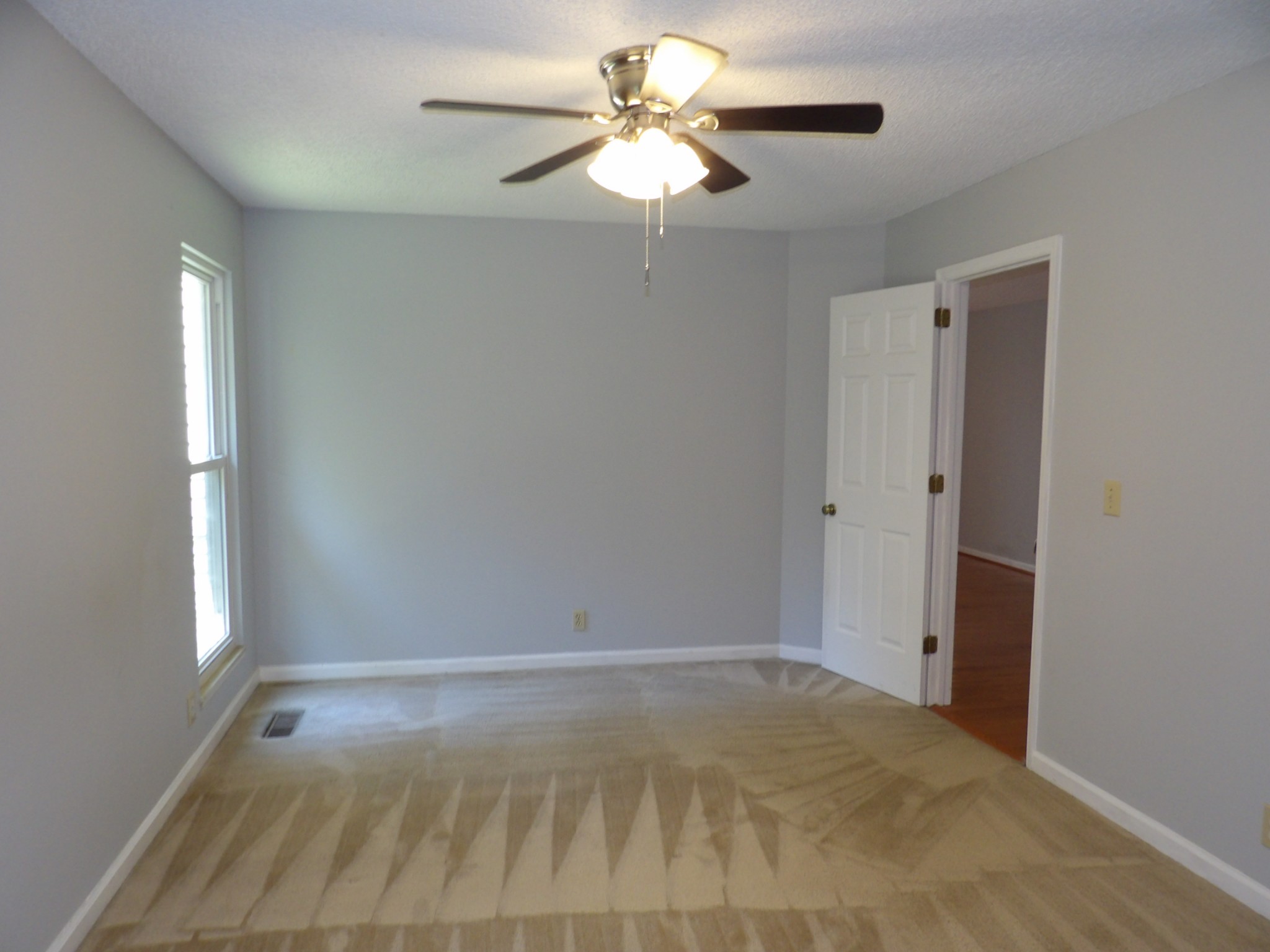 317 Cedarcliff Road Antioch, TN 37013 - Photo 12 of 31 a view of a chandelier fan and closet in a room