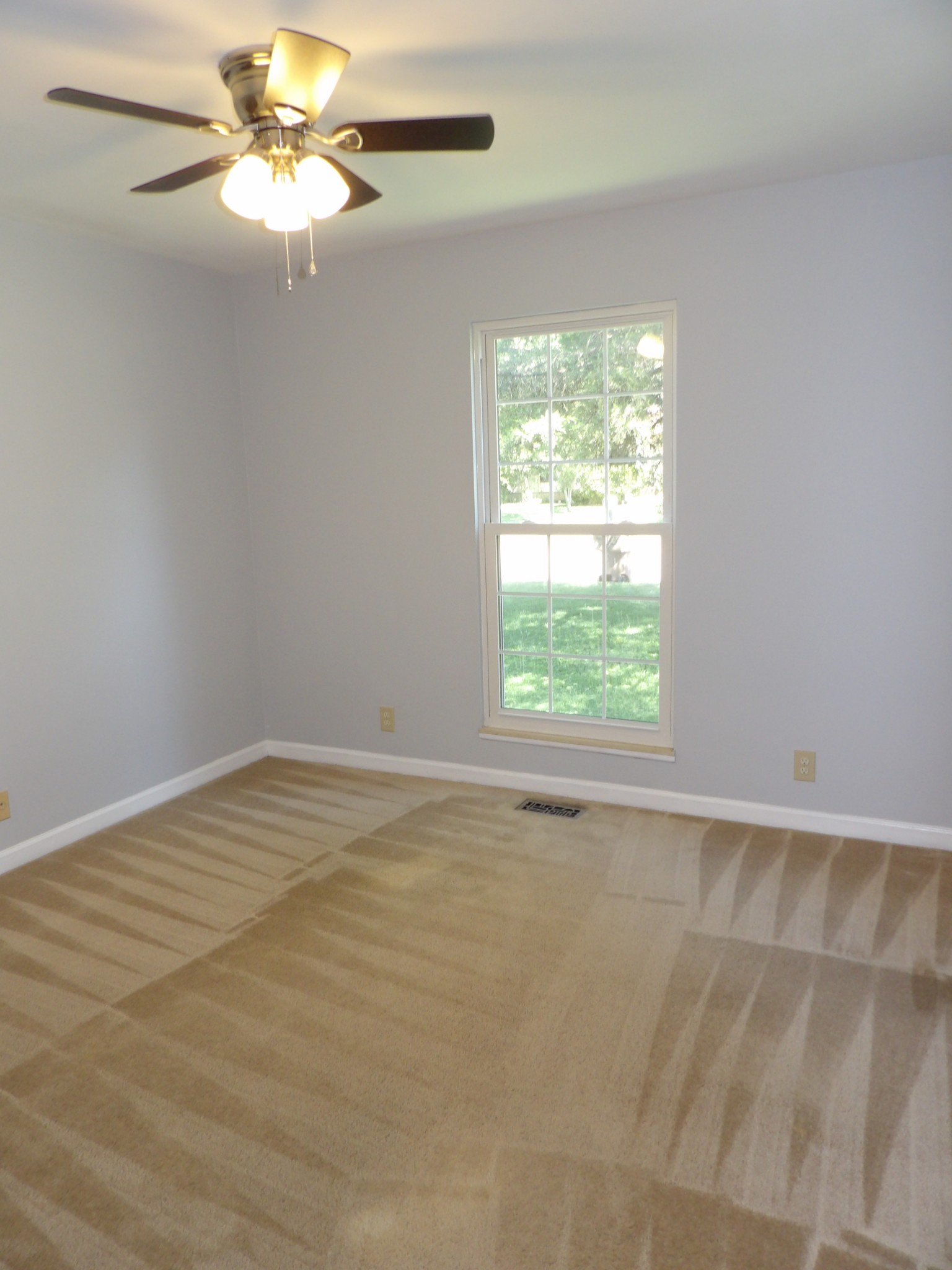 317 Cedarcliff Road Antioch, TN 37013 - Photo 19 of 31 an empty room with a window and a fan
