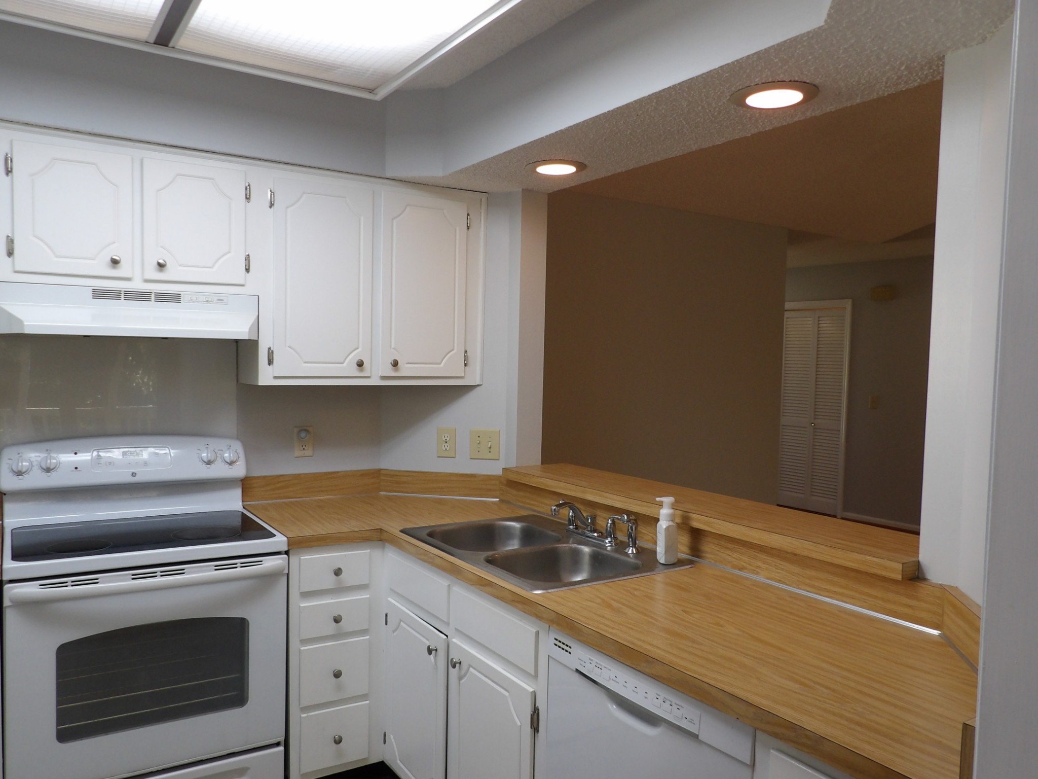 317 Cedarcliff Road Antioch, TN 37013 - Photo 10 of 31 a kitchen with a sink cabinets and stainless steel appliances