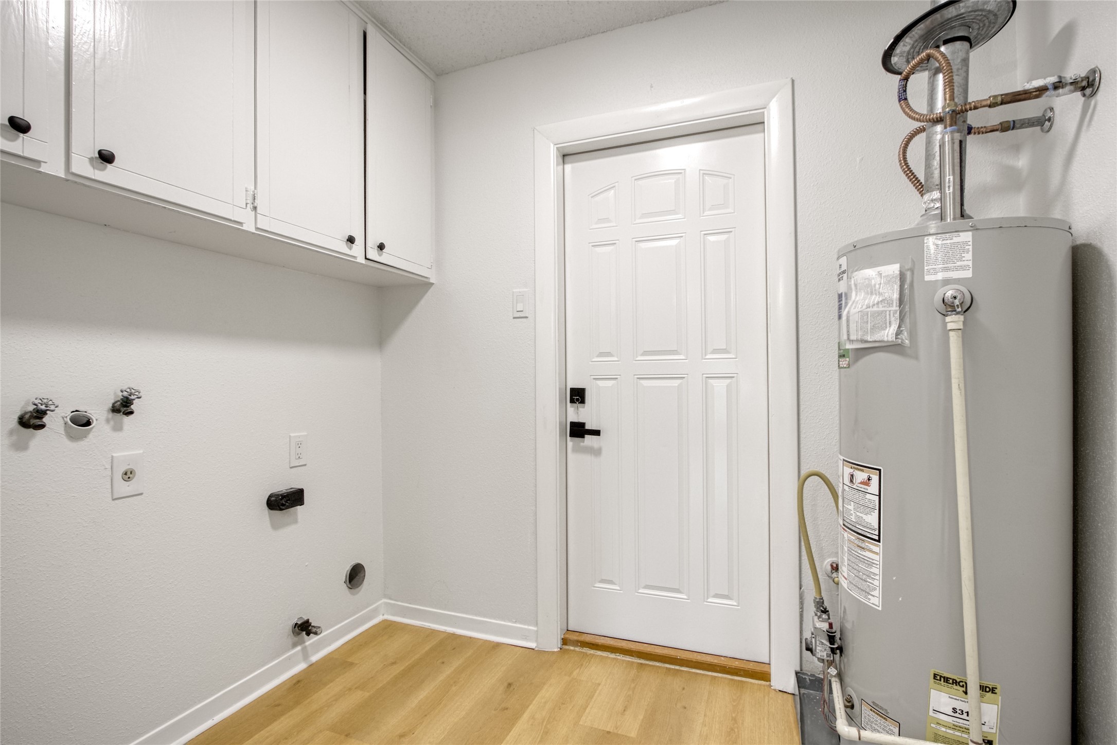 5802 Chrystell Lane Houston, TX 77092 - Photo 14 of 17 a bathroom with a bathtub and a shower