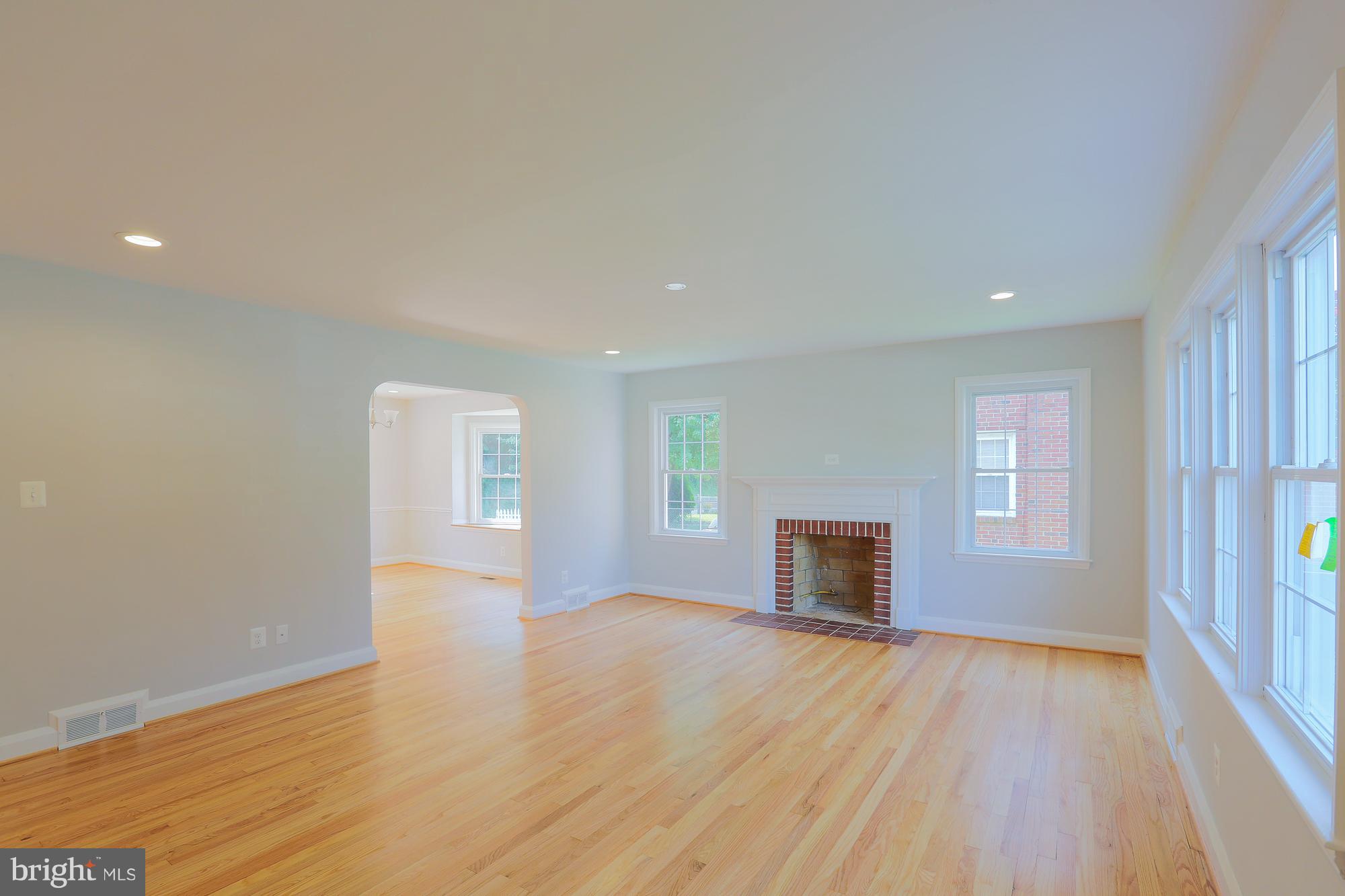 1866 Edgewood Road Towson, MD 21286 - Photo 2 of 30 Bright living room with wood burning fireplace