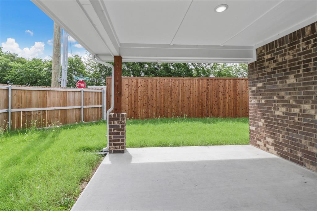 1601 Aleia Cove Sherman, TX 75092 - Photo 14 of 16 View of yard with a patio area