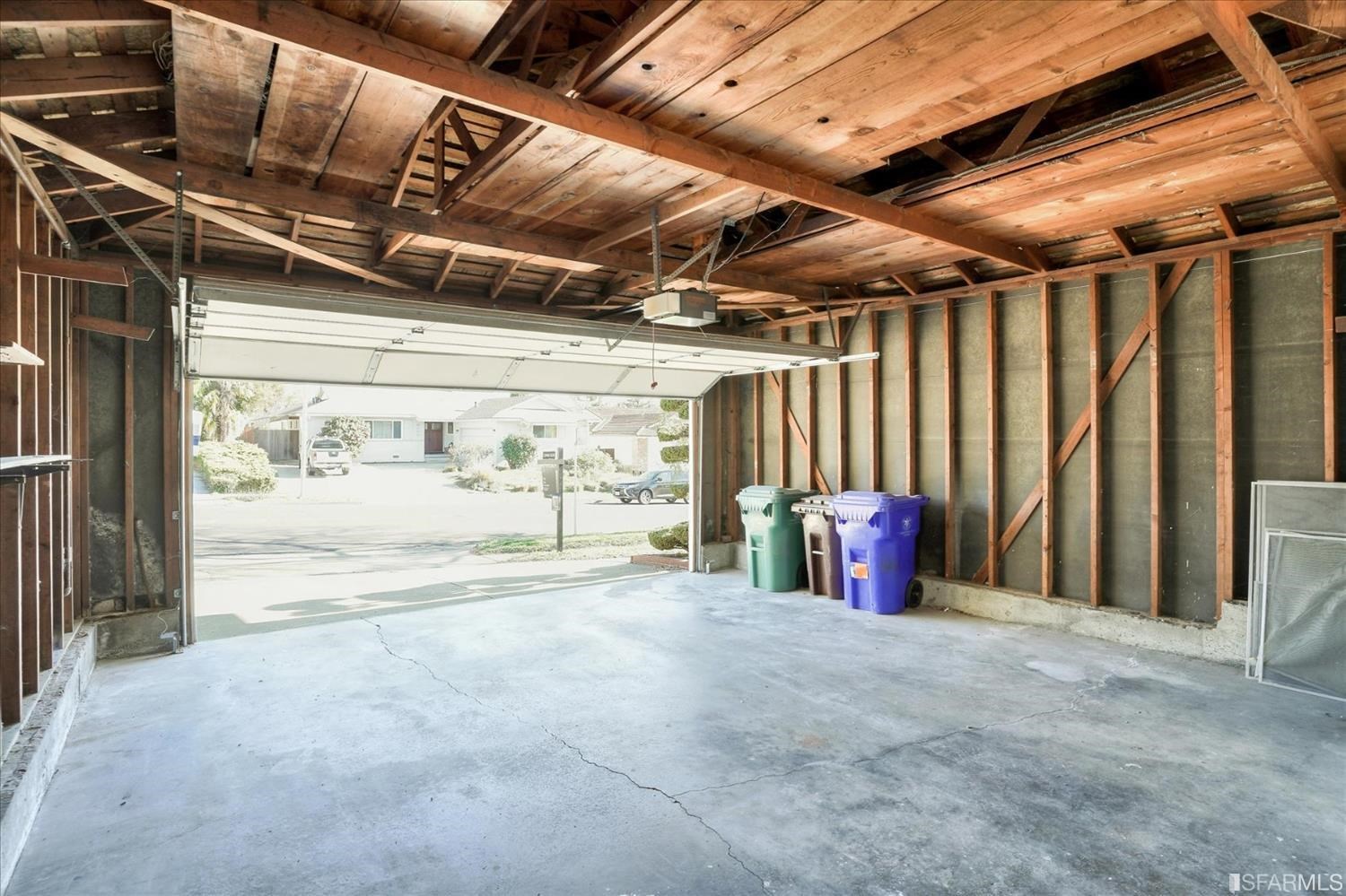 3419 May Road Richmond, CA 94803 - Photo 35 of 38 a view of water heater room with wooden walls