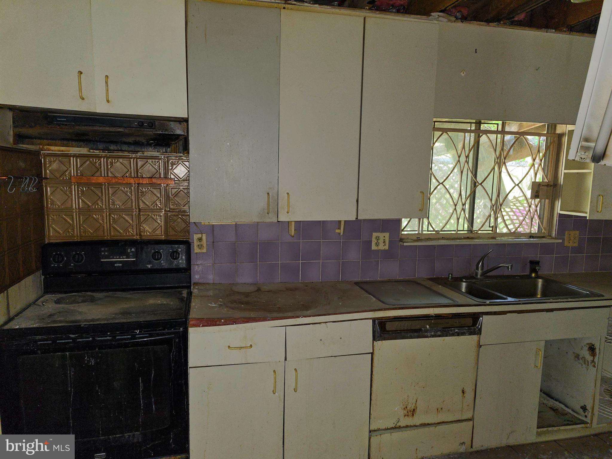 109 Cherry Valley Road Reisterstown, MD 21136 - Photo 20 of 23 a kitchen with a sink and cabinets