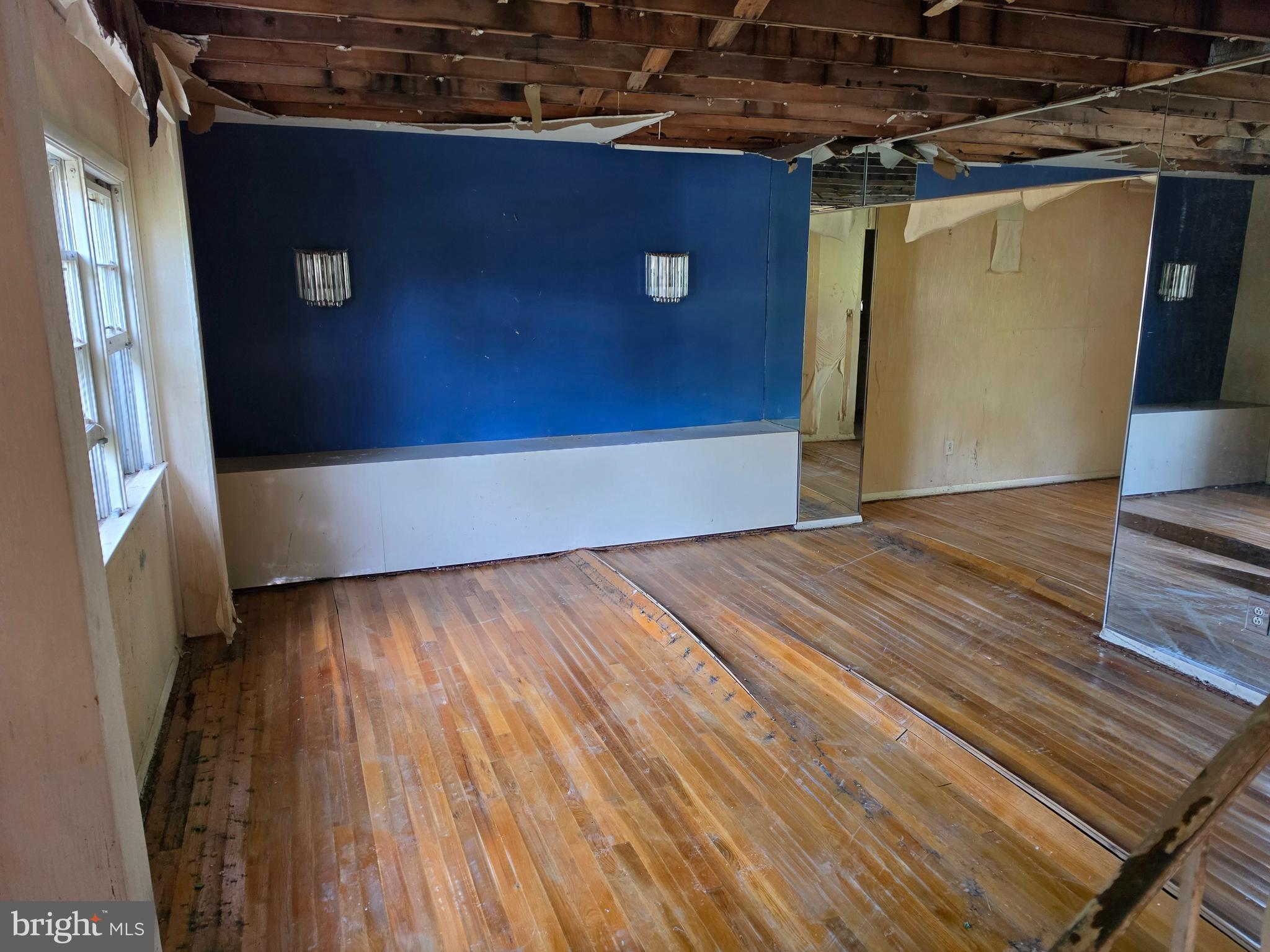 109 Cherry Valley Road Reisterstown, MD 21136 - Photo 3 of 23 a view of a room with wooden floor