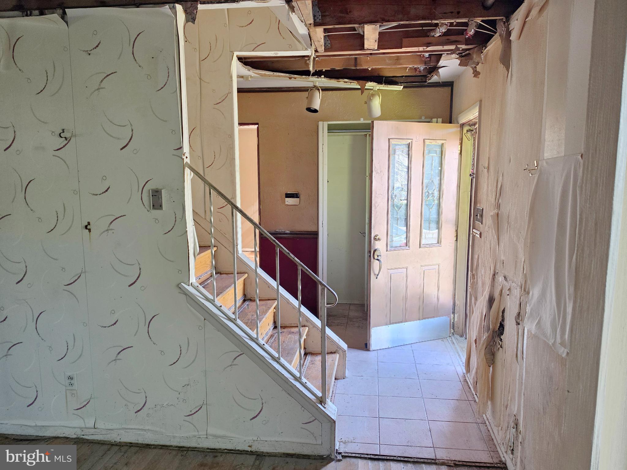 109 Cherry Valley Road Reisterstown, MD 21136 - Photo 6 of 23 a view of staircase with wooden floor and a shower
