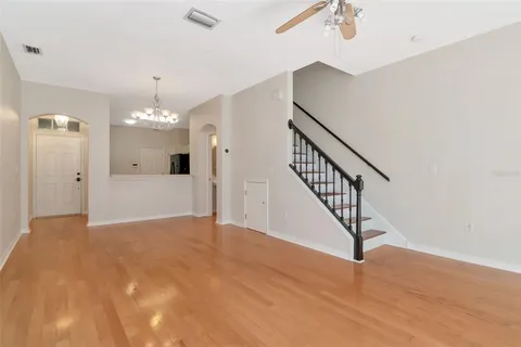 a view of a hallway with staircase