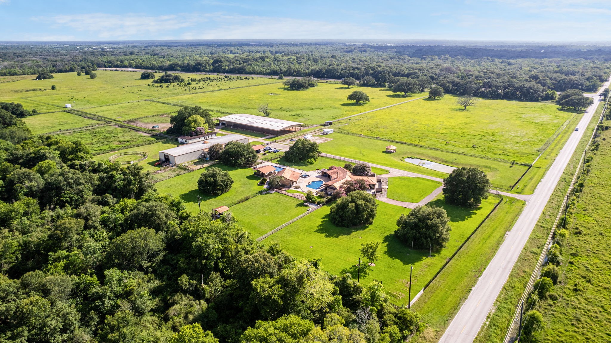 1226 County Road 45 Angleton, TX 77515 - Photo 15 of 30 a view of a swimming pool with an ocean view