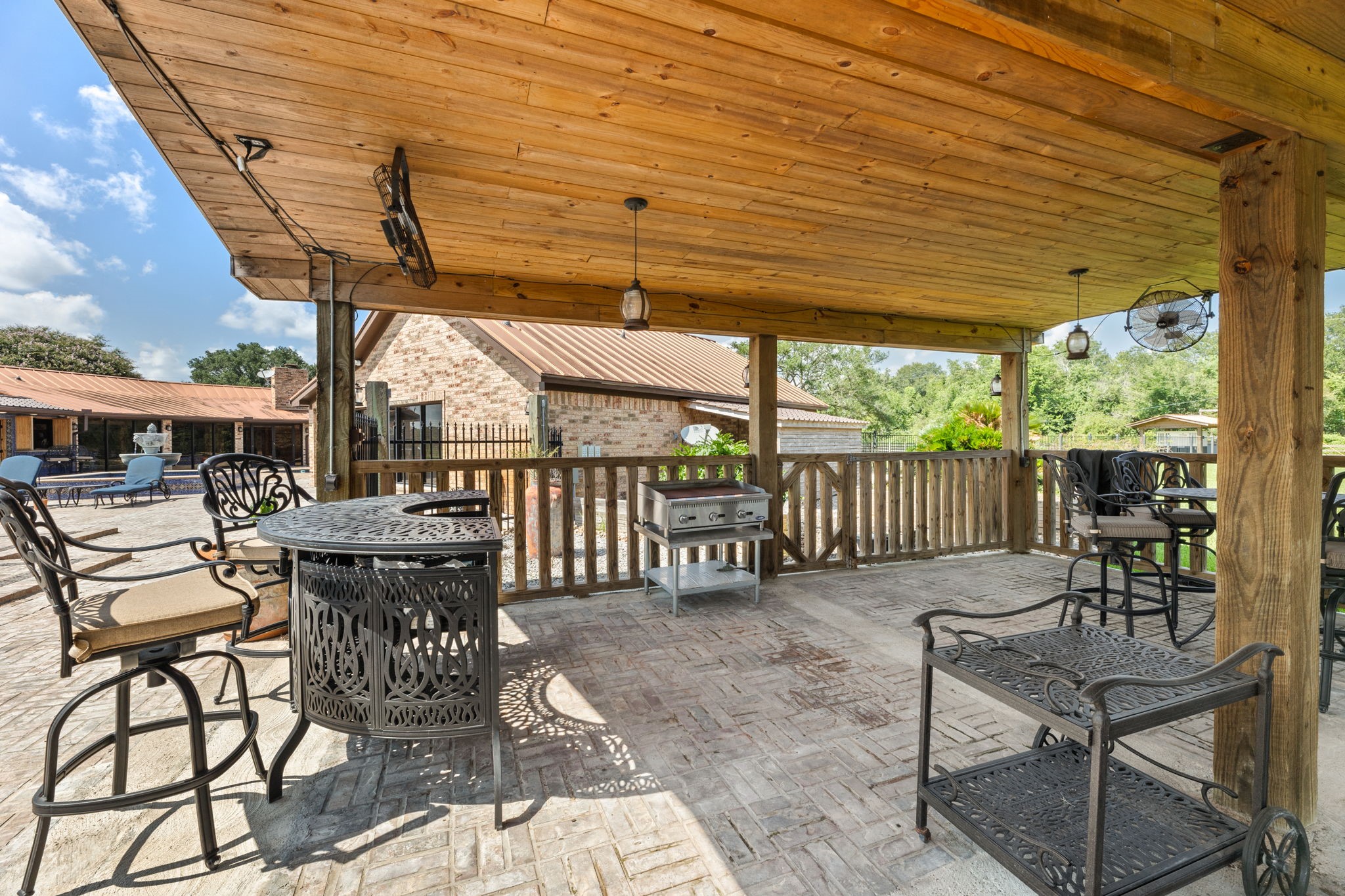 1226 County Road 45 Angleton, TX 77515 - Photo 19 of 30 a view of a chairs and table in the patio