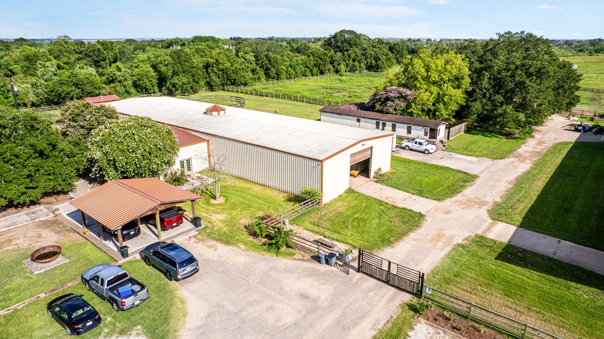 1226 County Road 45 Angleton, TX 77515 - Photo 2 of 30 an aerial view of a house having yard