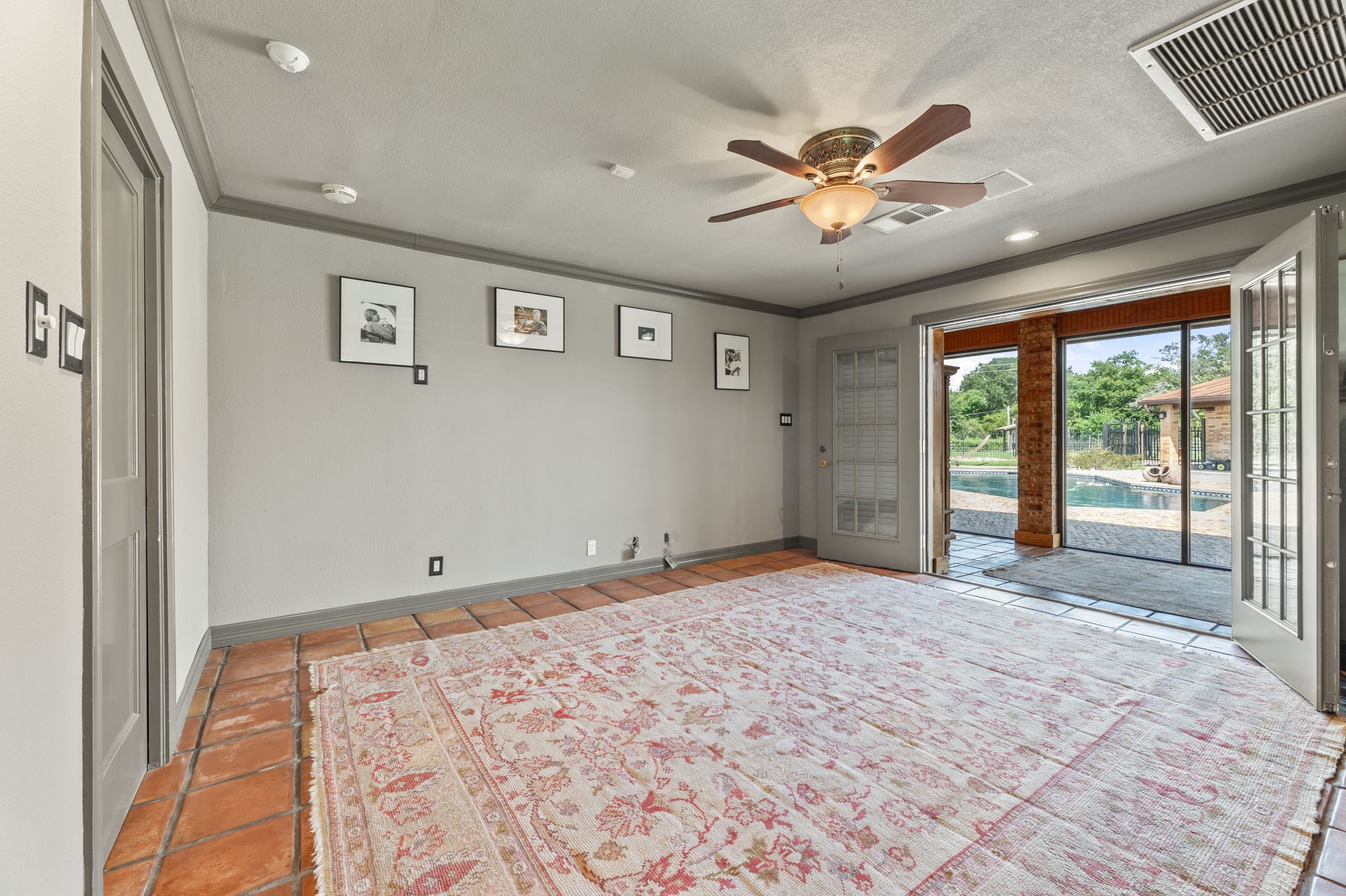 1226 County Road 45 Angleton, TX 77515 - Photo 26 of 30 a view of a livingroom with a ceiling fan and window