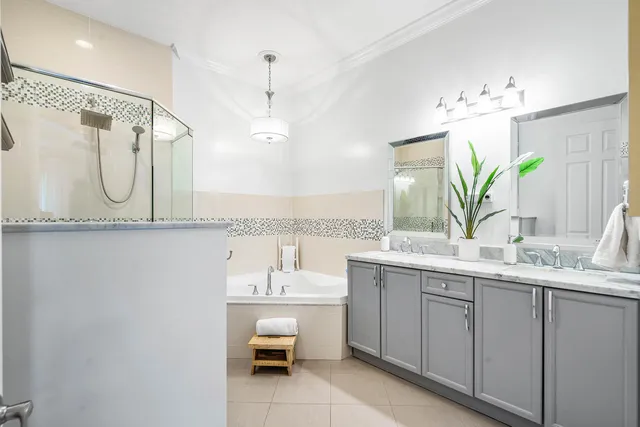 a bathroom with a bathtub and a shower