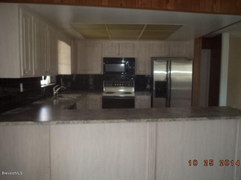 841 Egret Road Cocoa, FL 32926 - Photo 18 of 31 841 kitchen view 3