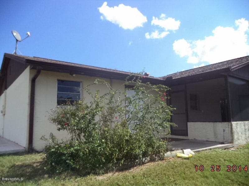 841 Egret Road Cocoa, FL 32926 - Photo 21 of 31 841 left rear