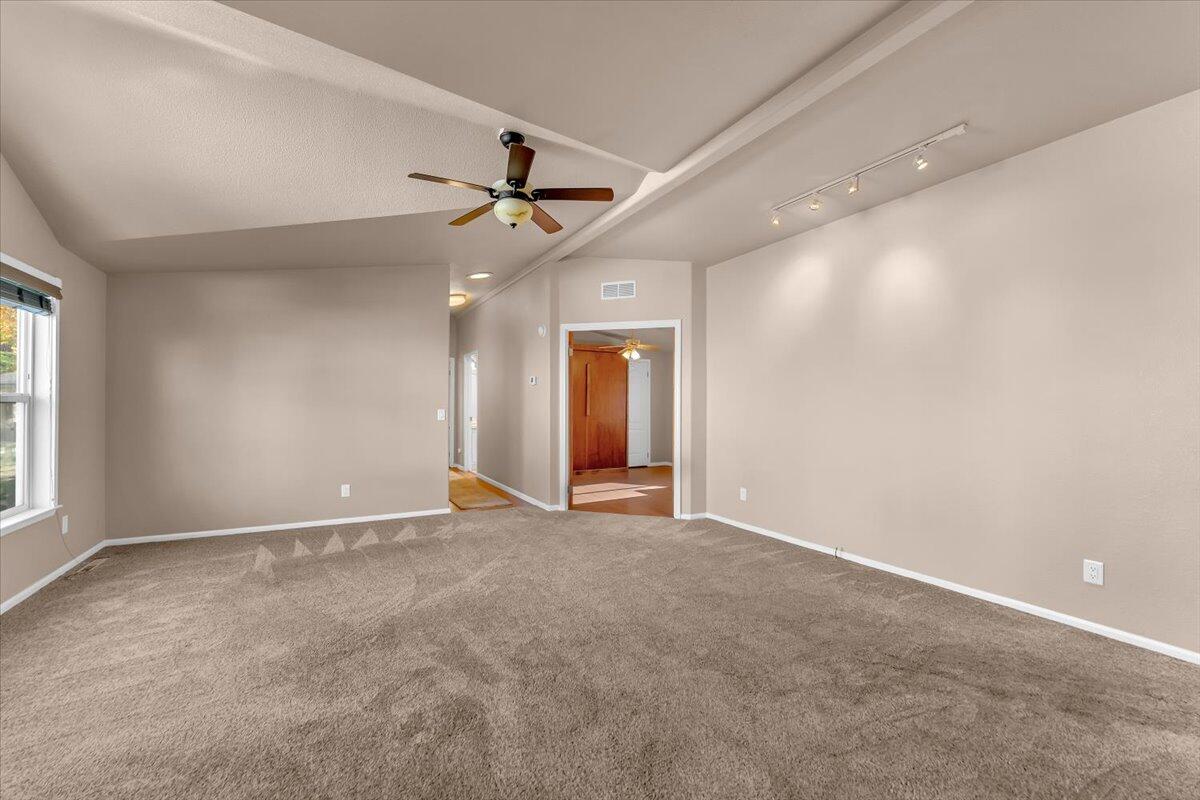 4719 Maple Trail Redding, CA 96003 - Photo 8 of 42 a view of an empty room with a window