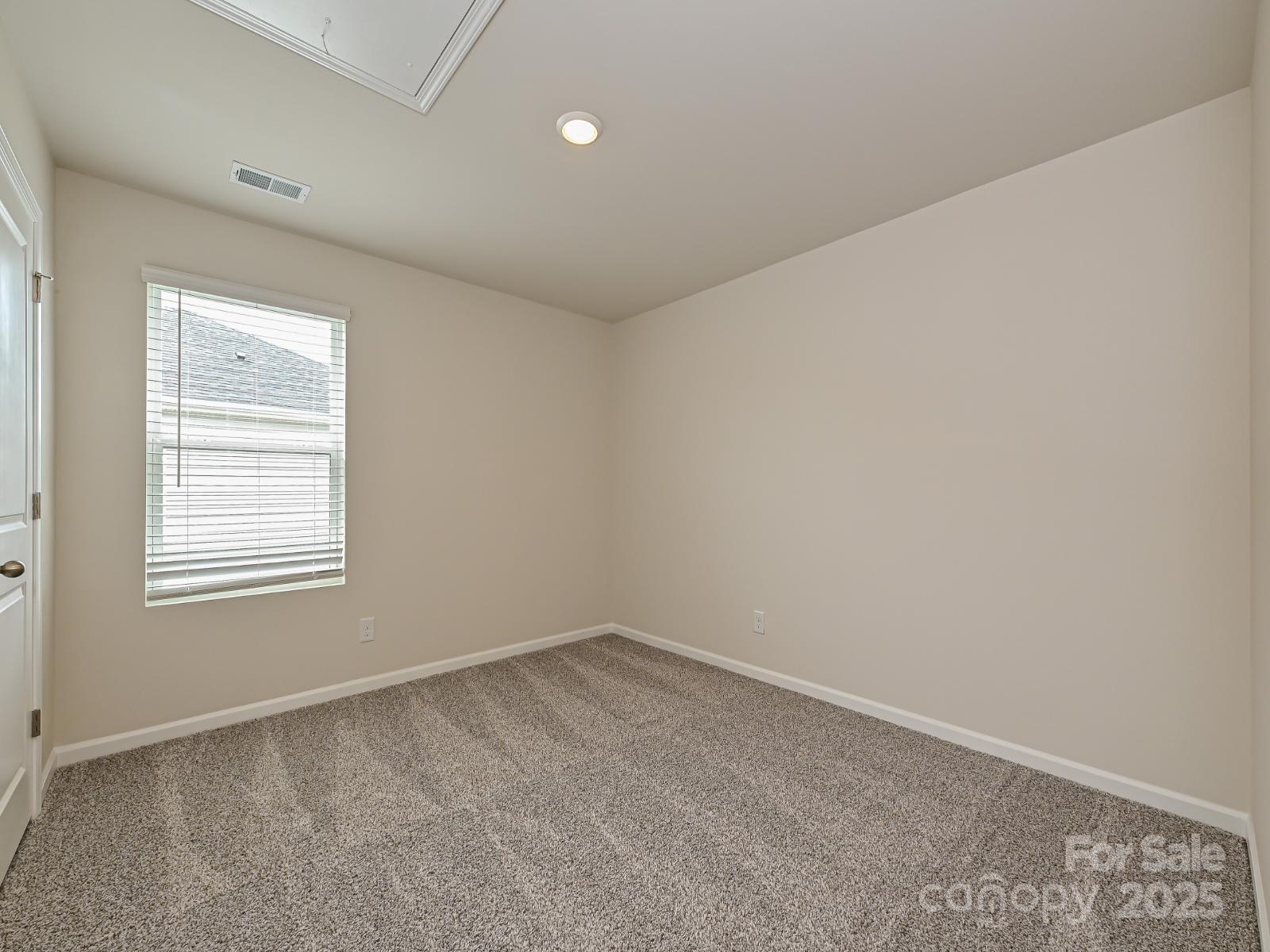 1441 31st Street Northeast Conover, NC 28613 - Photo 17 of 20 an empty room with a window