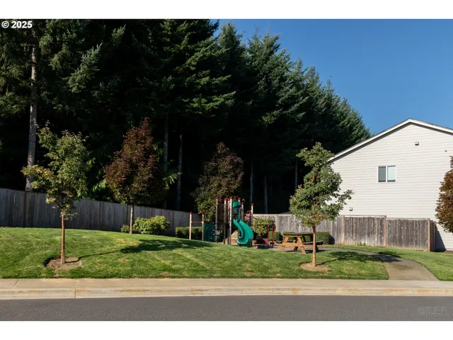 a view of a house and a yard