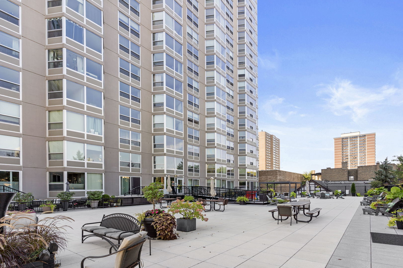 720 West Gordon Terrace, Unit 15N Chicago, IL 60613 - Photo 18 of 22 a city street lined with parked cars and buildings