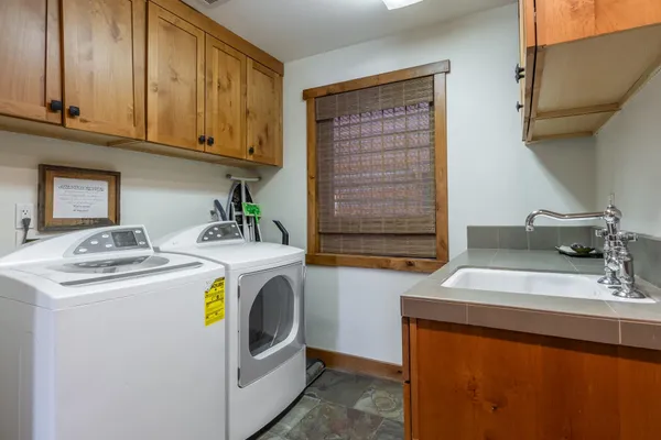 a front view of a house with a garage