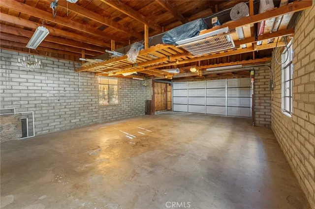 a view of room that has a bed