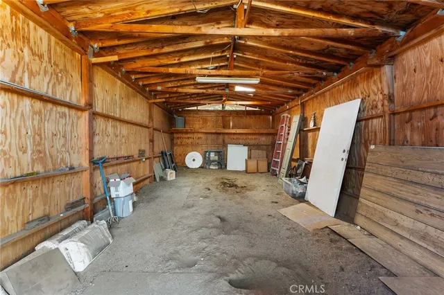 a view of a yard with swimming pool