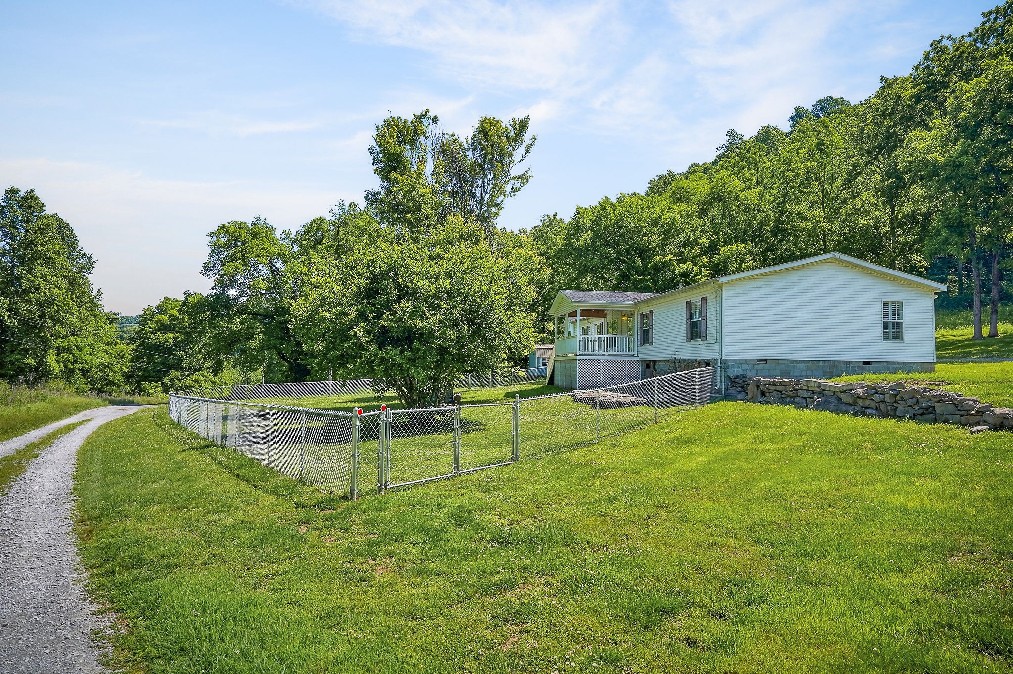 16130 Buffalo Valley Road Silver Point, TN 38582 - Photo 1 of 47 a view of a house with pool and a yard