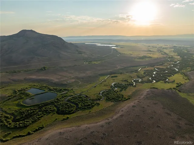 a view of a lake with a mountain