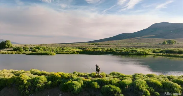 a view of a lake with a mountain