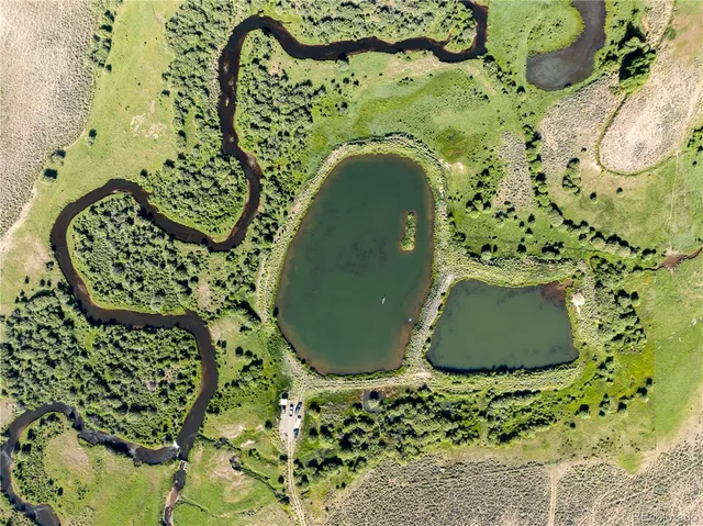 a view of an ocean and a mountain
