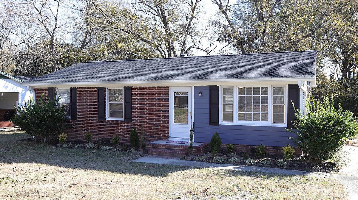 820 Cross Link Road Raleigh, NC 27610 - Photo 1 of 13 a view of a house with a yard