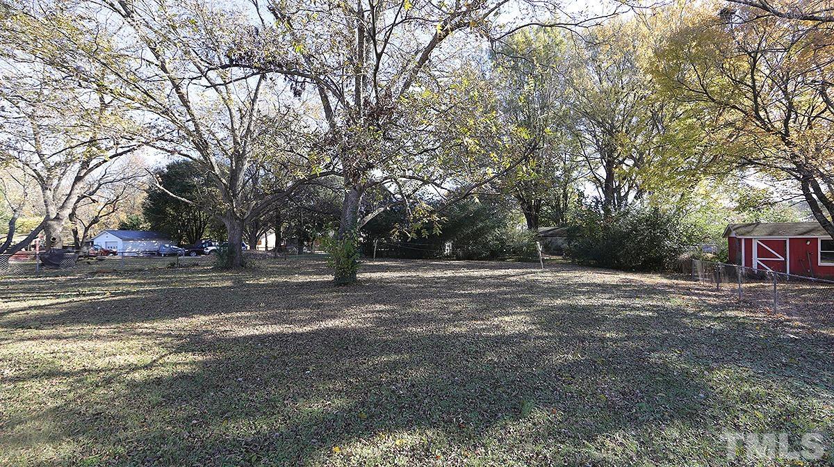 820 Cross Link Road Raleigh, NC 27610 - Photo 12 of 13 a view of road and trees