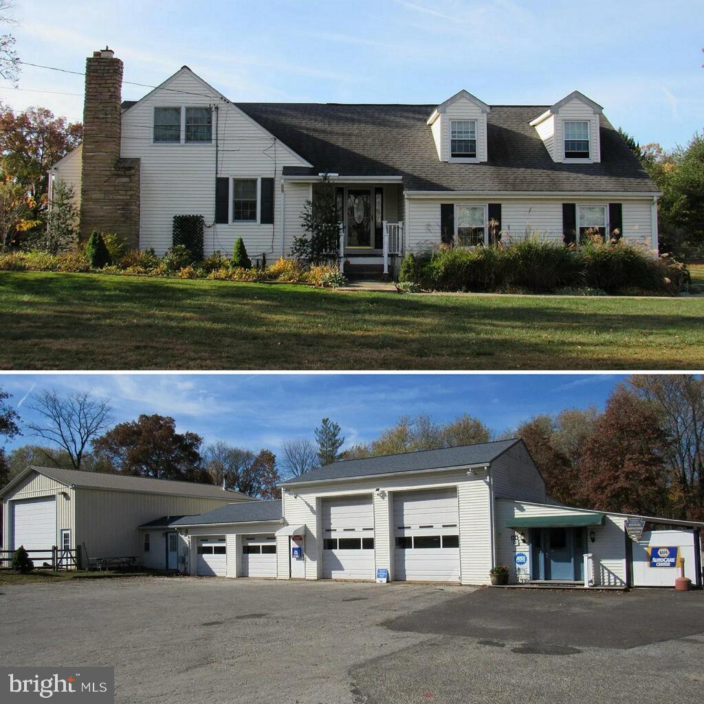 48 Ridge Road Phoenixville, PA 19460 - Photo 1 of 54 a front view of a house with a garden