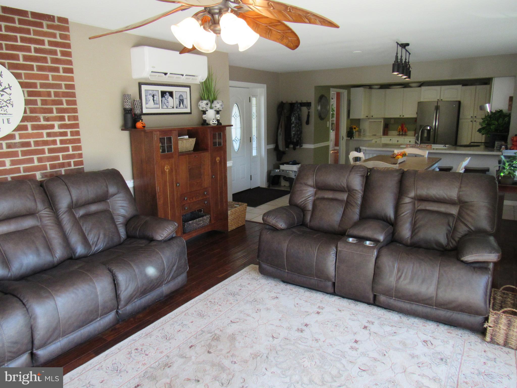 48 Ridge Road Phoenixville, PA 19460 - Photo 26 of 54 a living room with furniture and a wooden floor