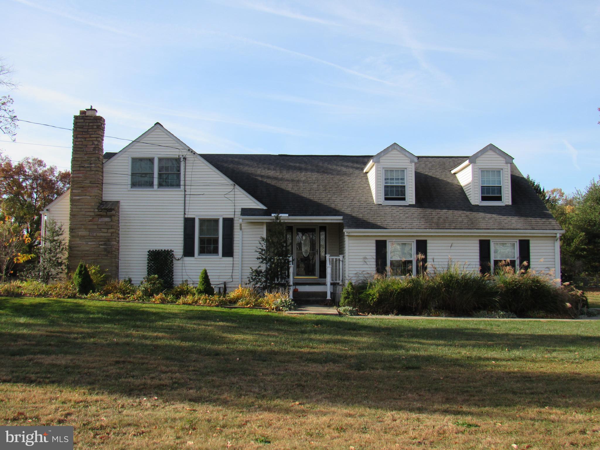 48 Ridge Road Phoenixville, PA 19460 - Photo 3 of 54 a front view of house with yard and green space