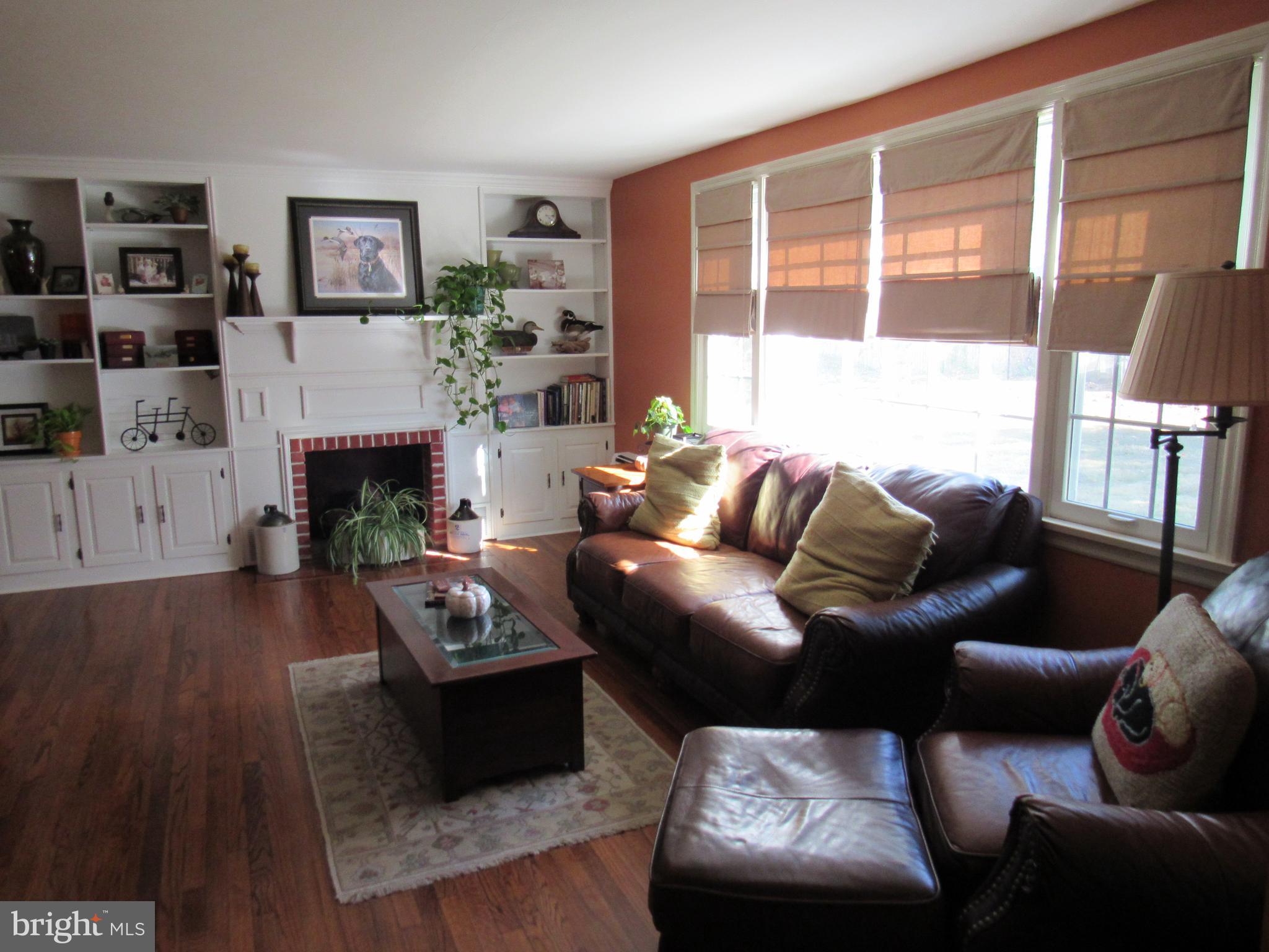 48 Ridge Road Phoenixville, PA 19460 - Photo 31 of 54 a living room with furniture and a fireplace