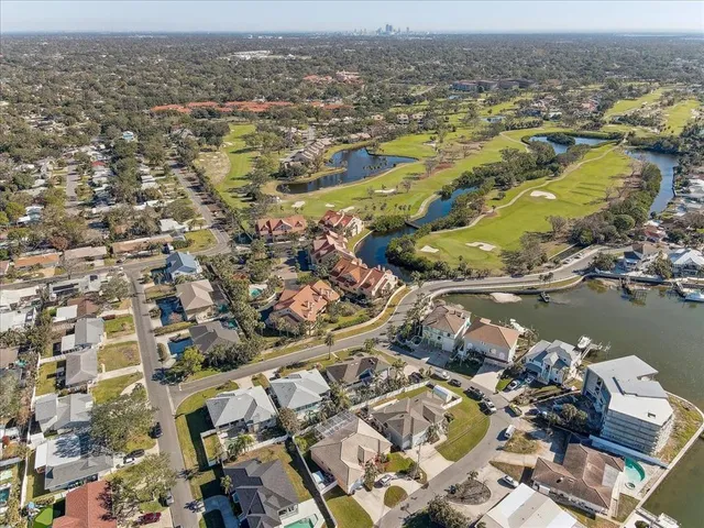 an aerial view of residential building with parking space