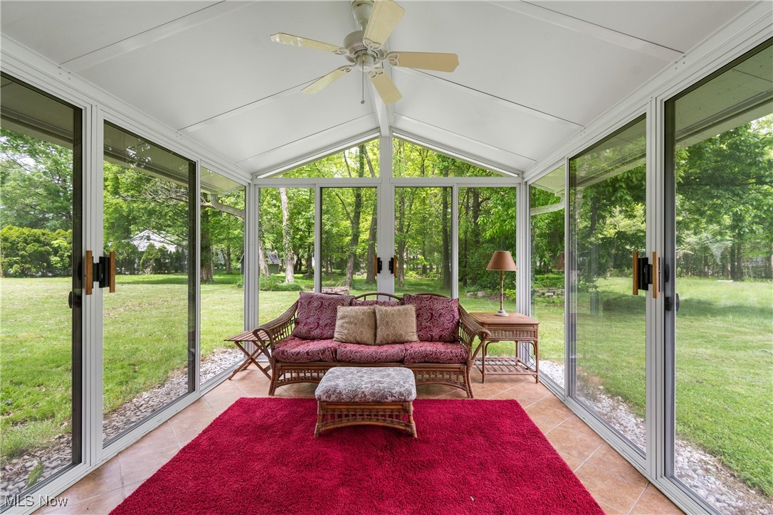 6751 Glenview Road Cleveland, OH 44143 - Photo 23 of 31 Sunroom with plenty of natural light, a ceiling fan, and lofted ceiling