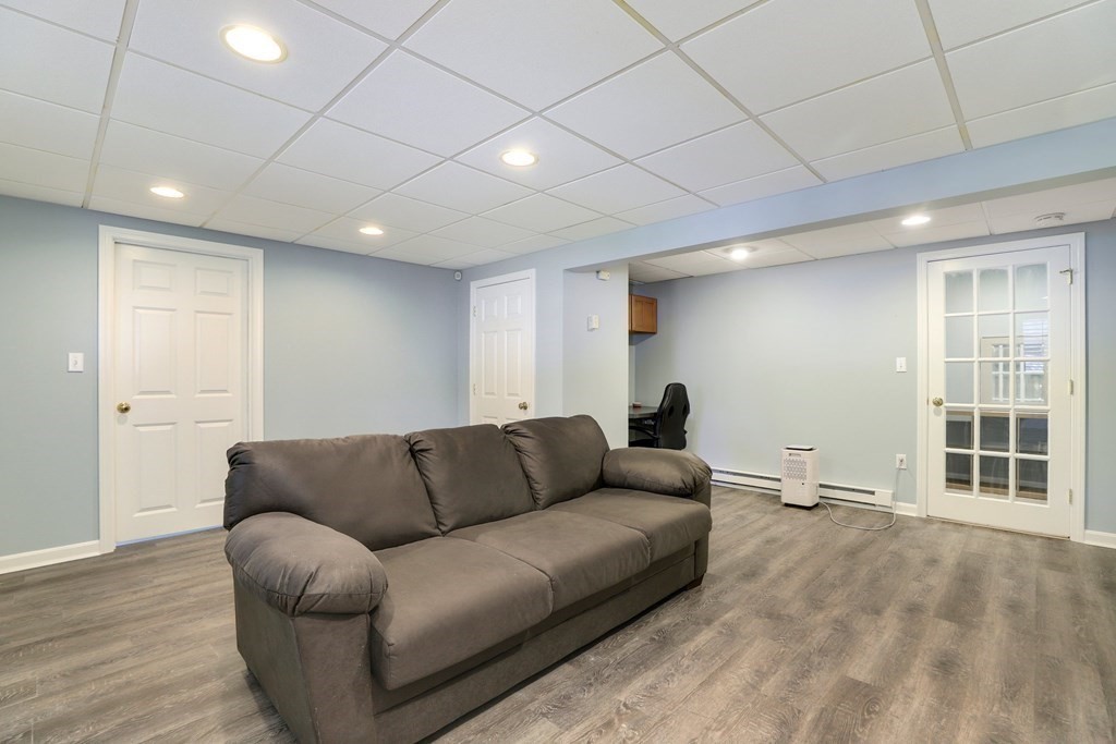 16 Oakbluff Road Sagamore Beach, MA 02562 - Photo 23 of 34 a living room with furniture and a window